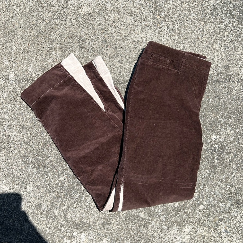 Brown corduroy flare pants with white details